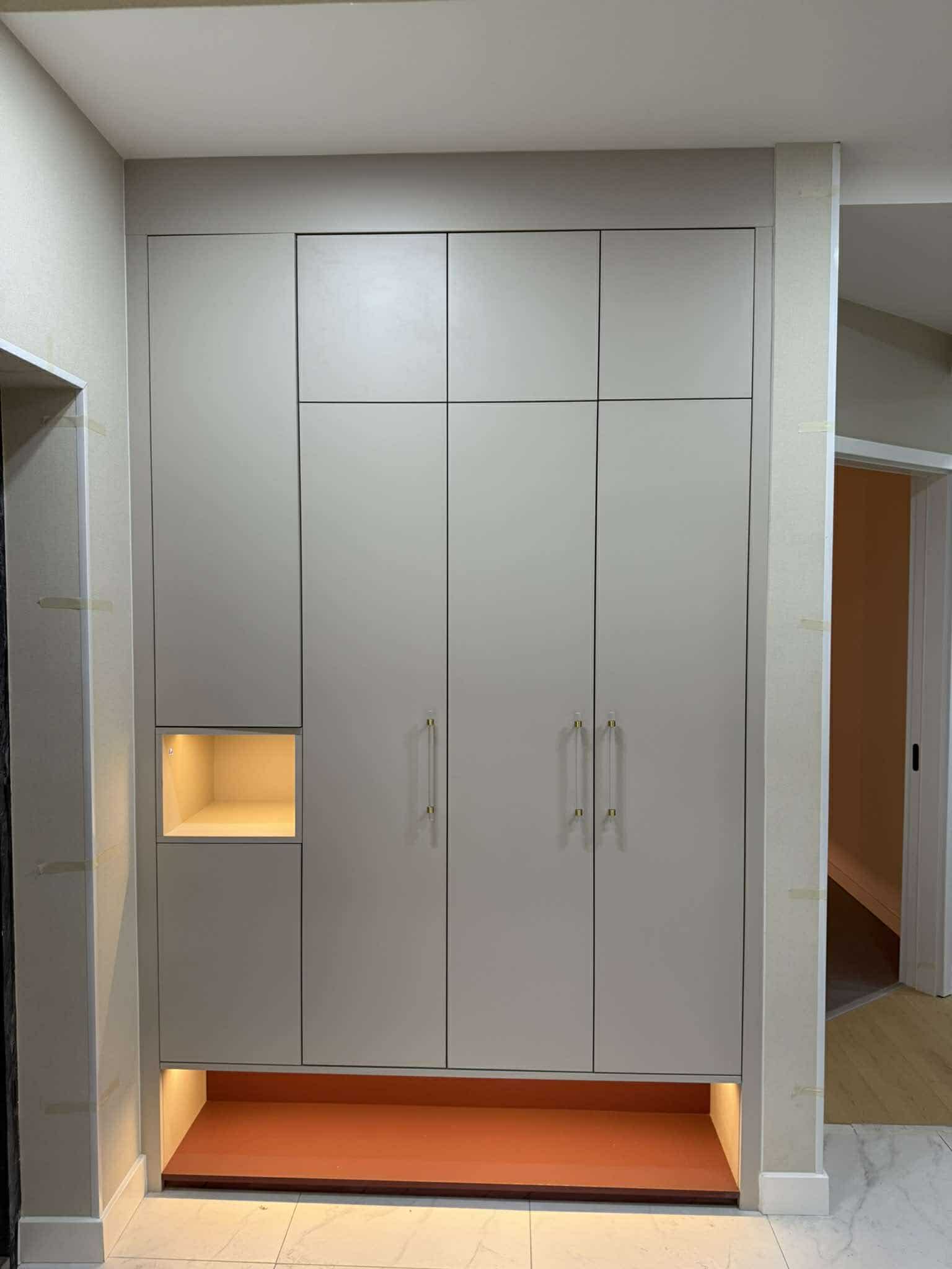 Hallway wardrobe in grey with glowing niche