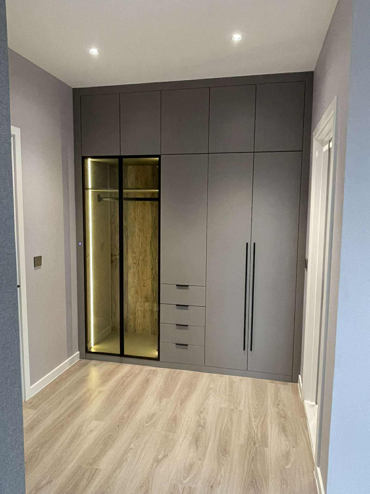 Charcoal wardrobe with open glass-door section