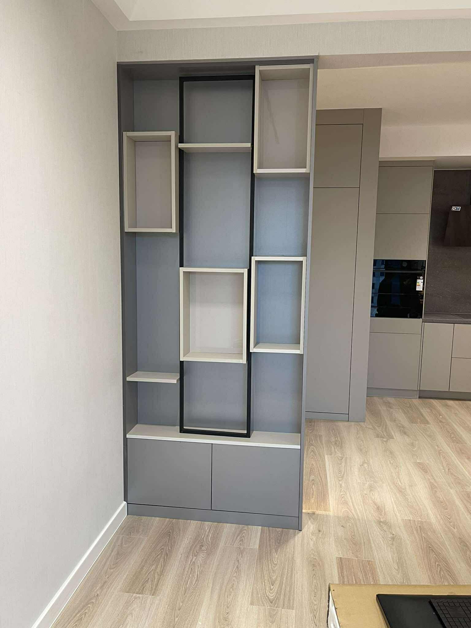 Geometric open shelving unit as room divider