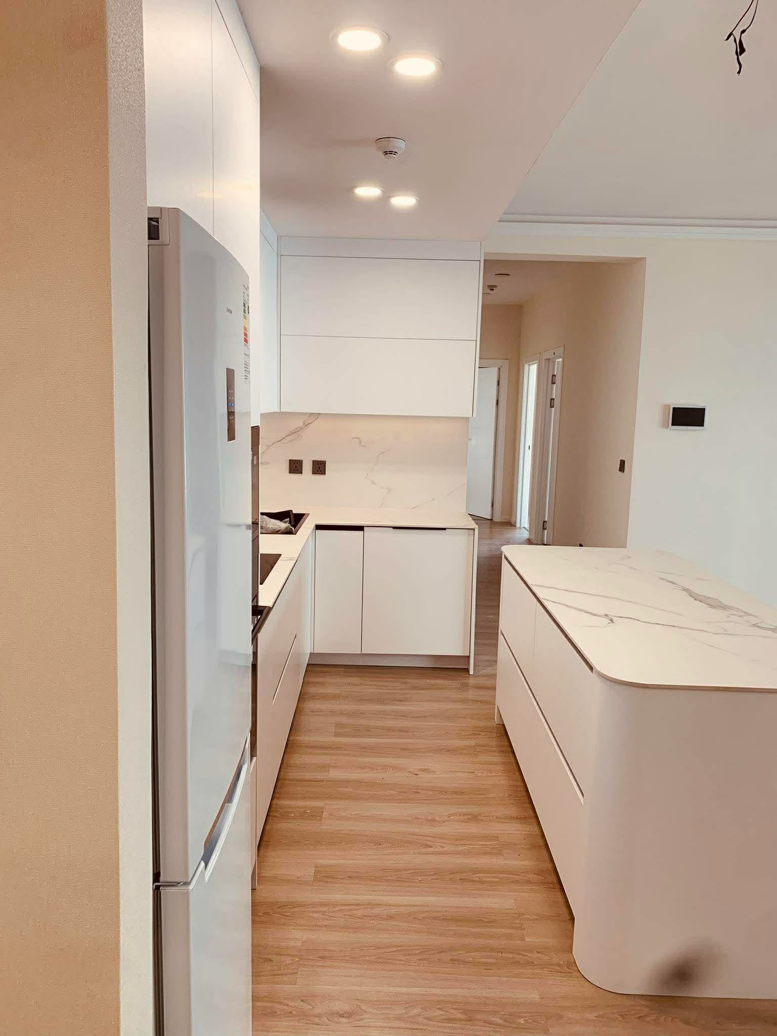 Light wood kitchen with under-counter LED strip